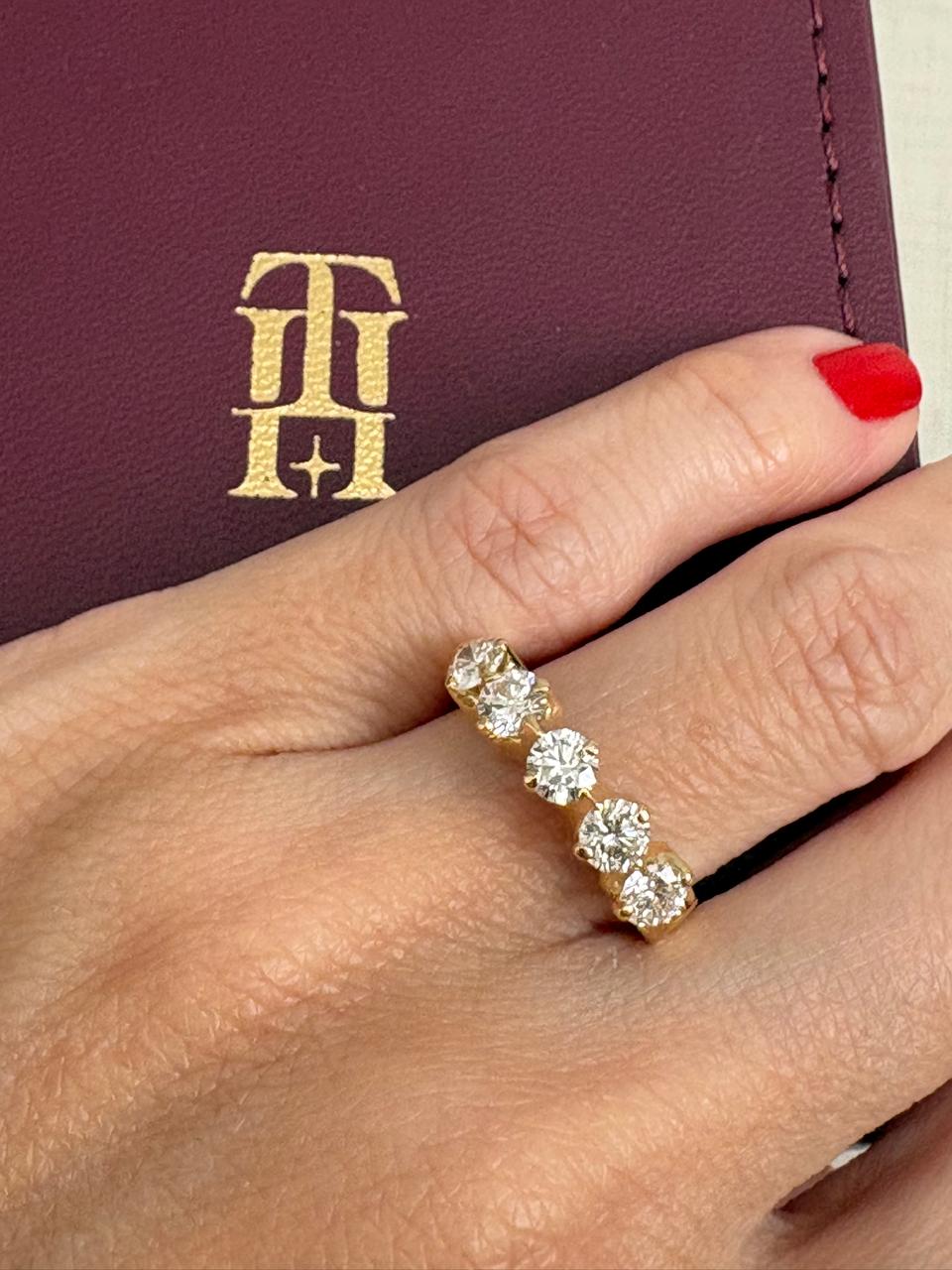 Meia aliança de diamantes em ouro amarelo 18K 750